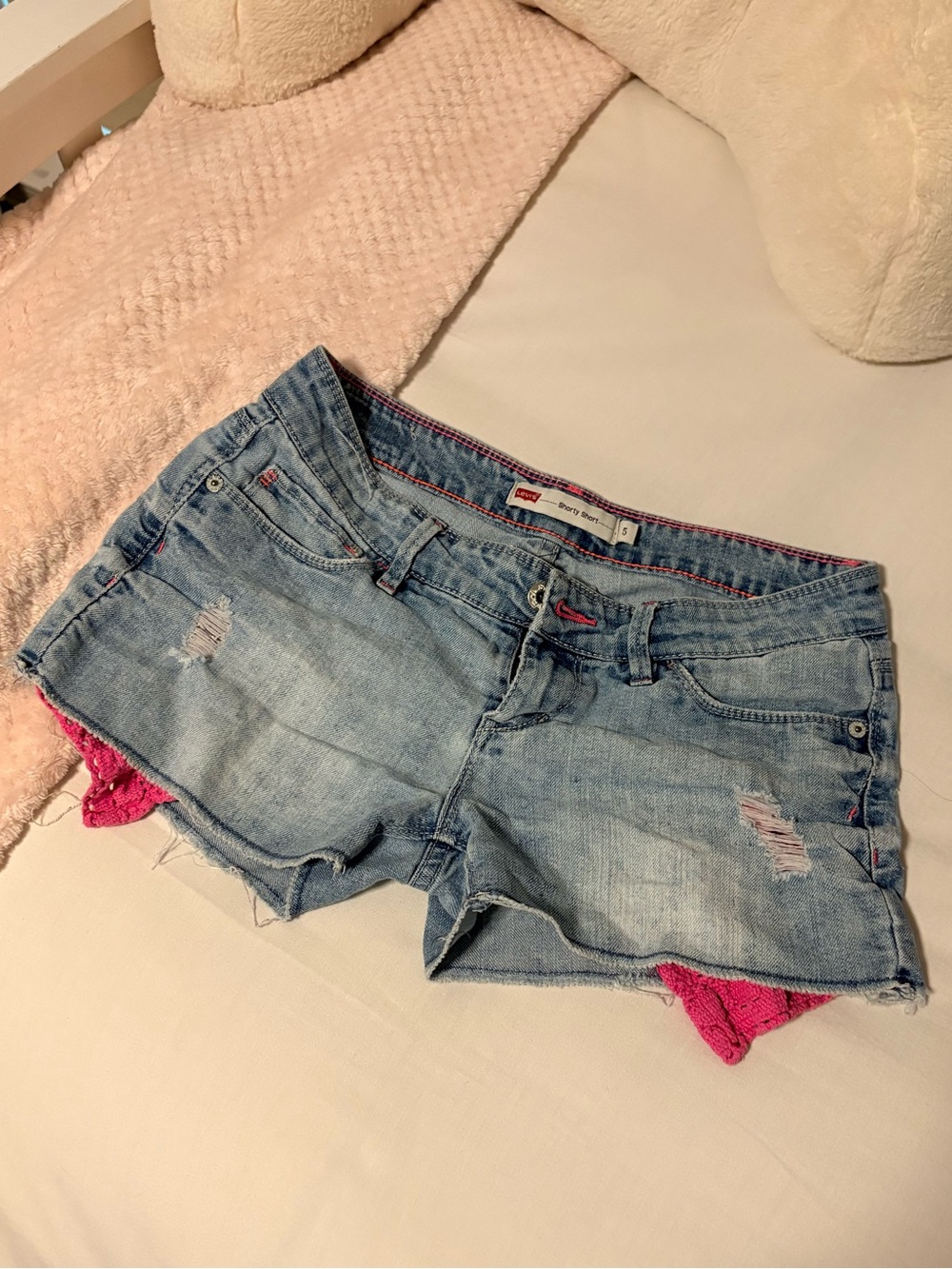 Vintage Levi's Light Blue Denim Shorts with Pink Lace Accent